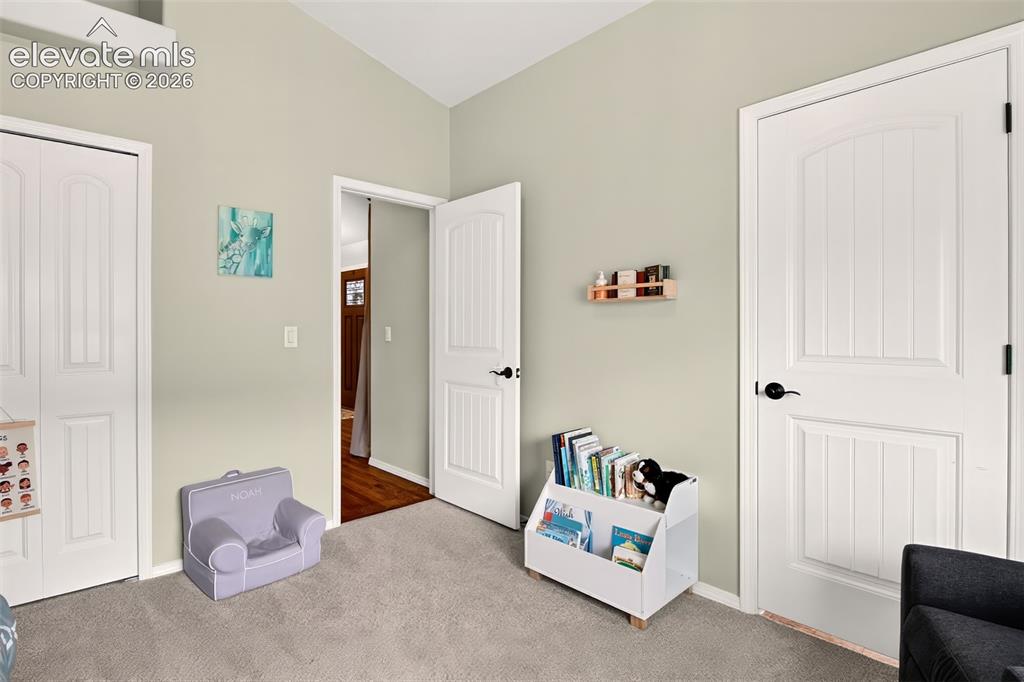 Image 23 of 41: Main level second bedroom