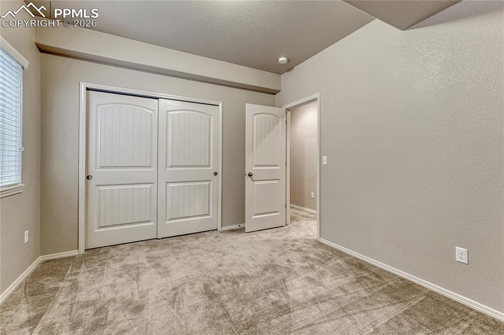 Image 28 of 38: Bedroom