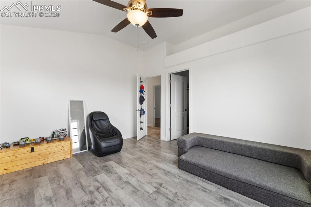 Image 29 of 50: Upper Level: Bedroom #4, with Walk-In Closet