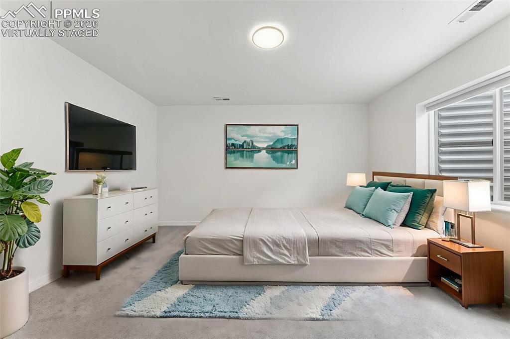 Image 36 of 50: Basement Level Bedroom #5; Virtually Staged*