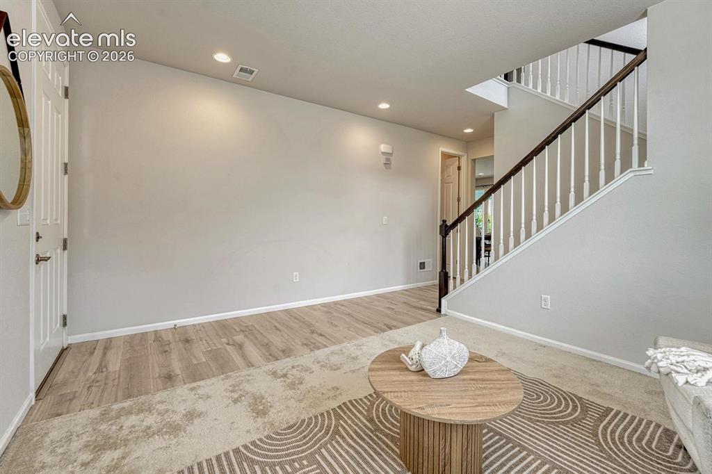 Image 8 of 50: Front Entry into the Living Room.