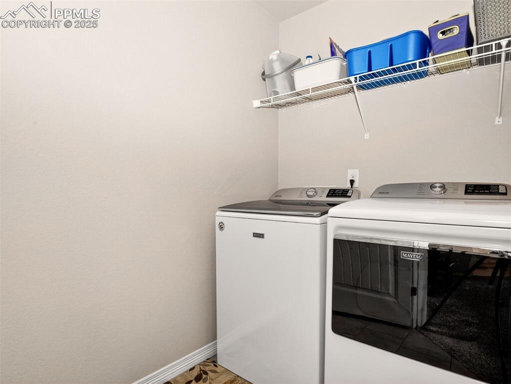 Image 22 of 48: Upper-level laundry room.