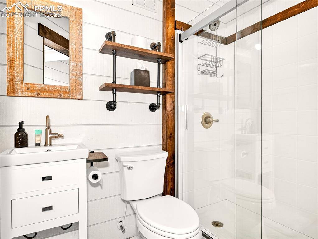 Image 35 of 48: Basement-level 3/4 bath.
