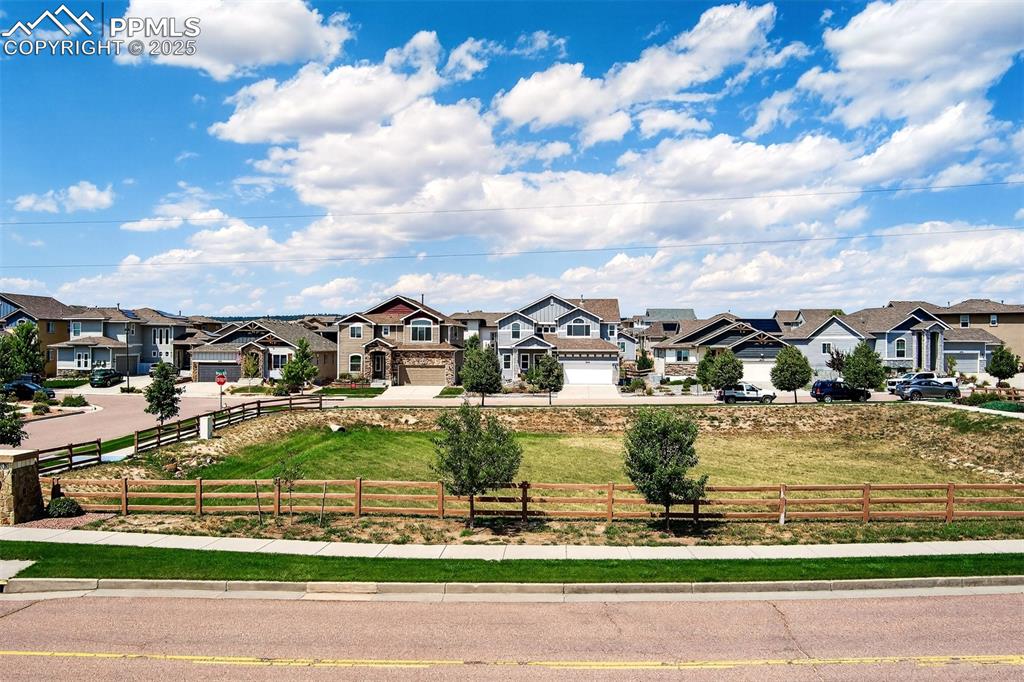 Image 47 of 48: Open space directly across the street... extra room for the kiddos to play!