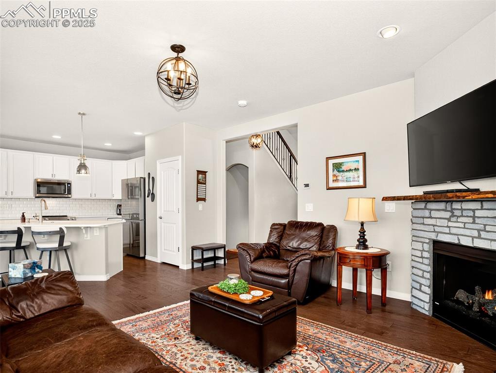 Image 9 of 48: View of the kitchen from the family room.