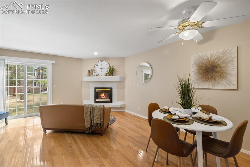 Image 10 of 37: This beautiful townhome is one of the few that features real wood flooring,