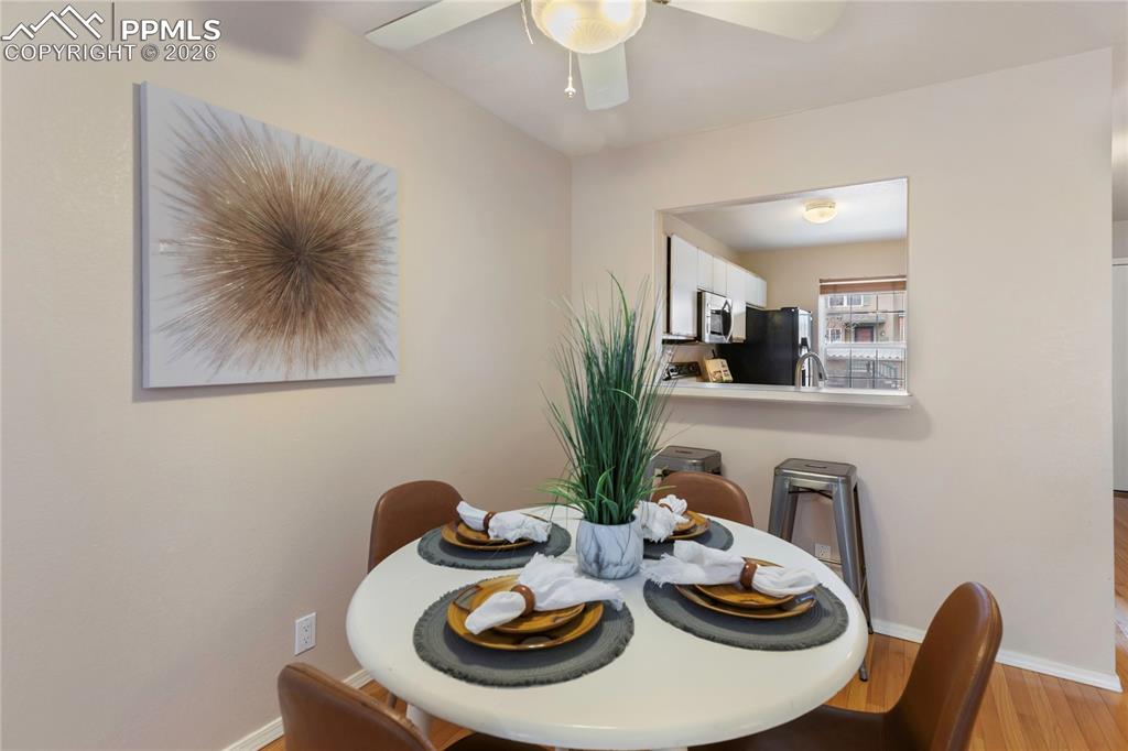 Image 13 of 37: In addition to this dining area, there is a breakfast bar as well!
