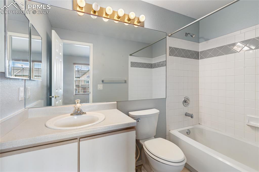 Image 29 of 37: Upper level full bathroom - this one adjoins the 2nd bedroom!