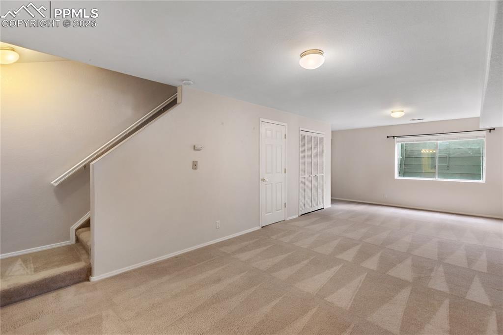 Image 34 of 37: Basement bedroom could also be used as a family room