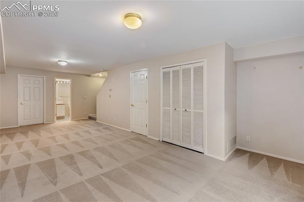 Image 35 of 37: Basement bedroom could also be used as a family room - with adjoining 3/4 b