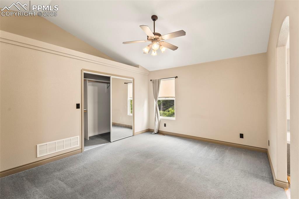 Image 18 of 34: Master bedroom and walk in closet. 