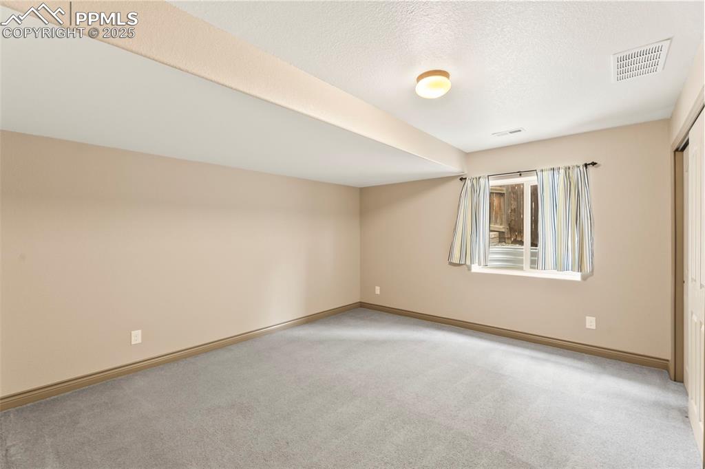 Image 25 of 34: Bedroom 2 in basement