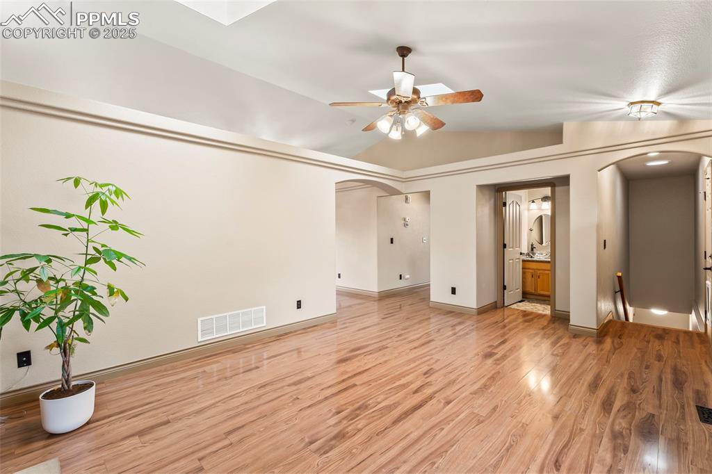Image 8 of 34: Guest bath off of living room.