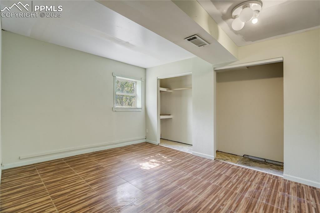 Image 17 of 24: Unfurnished bedroom featuring baseboards and a closet