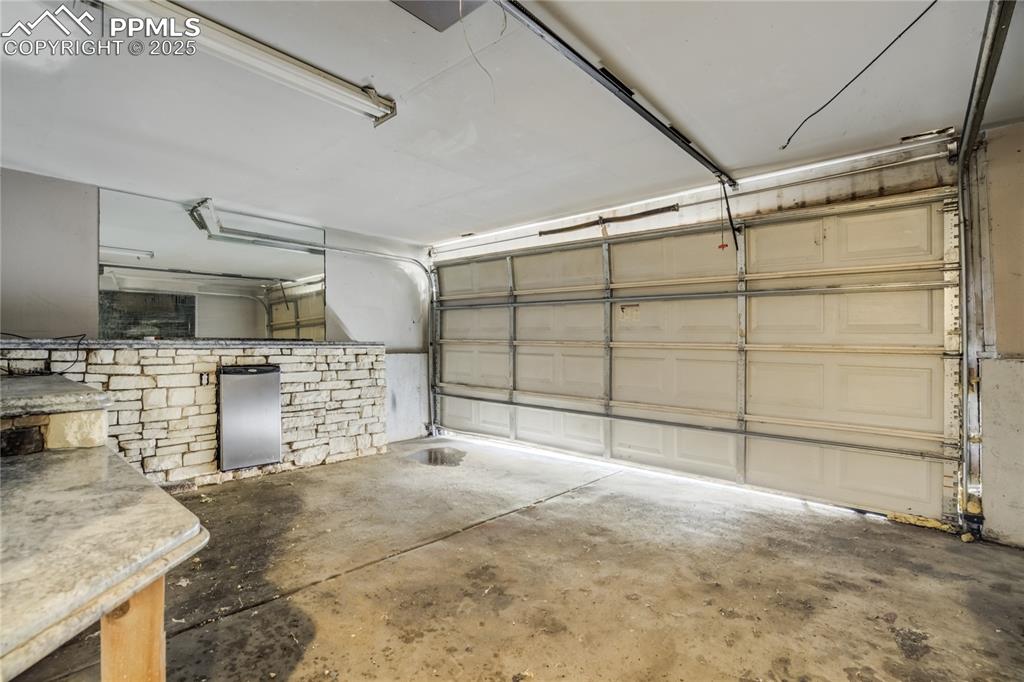 Image 21 of 24: View of garage