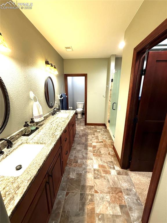 Image 19 of 50:  Primary bathroom