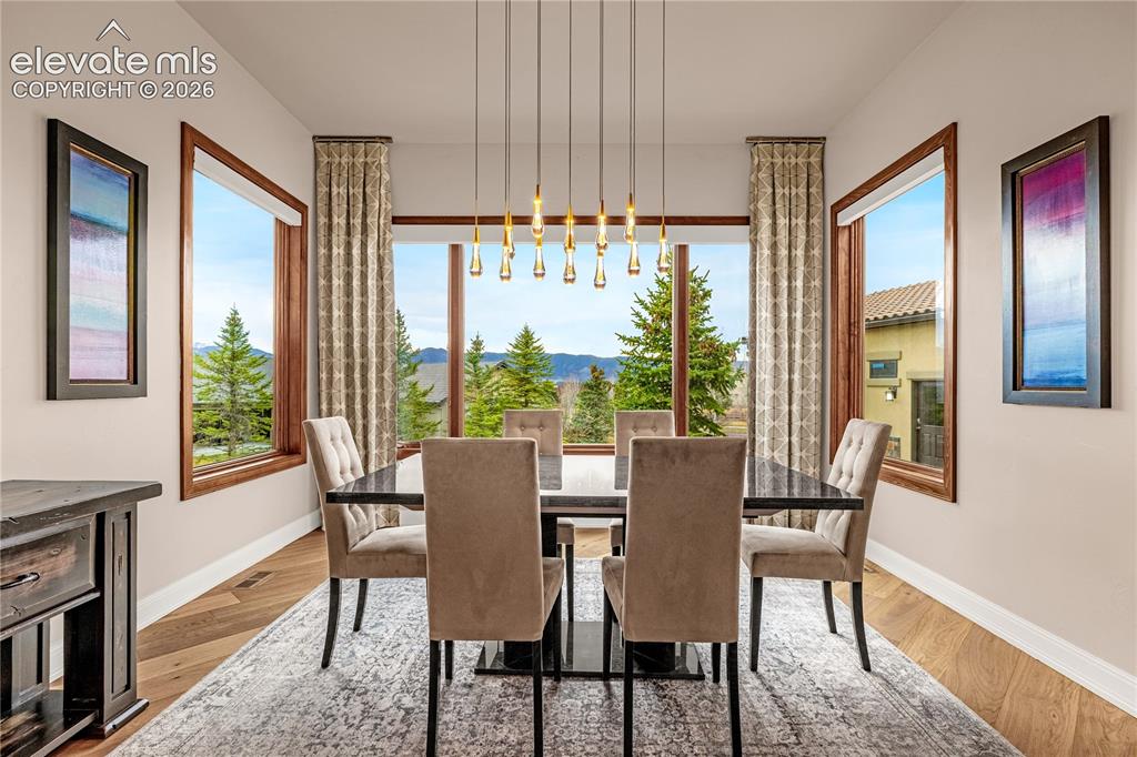 Image 14 of 36: Dining room looking out over the mountains