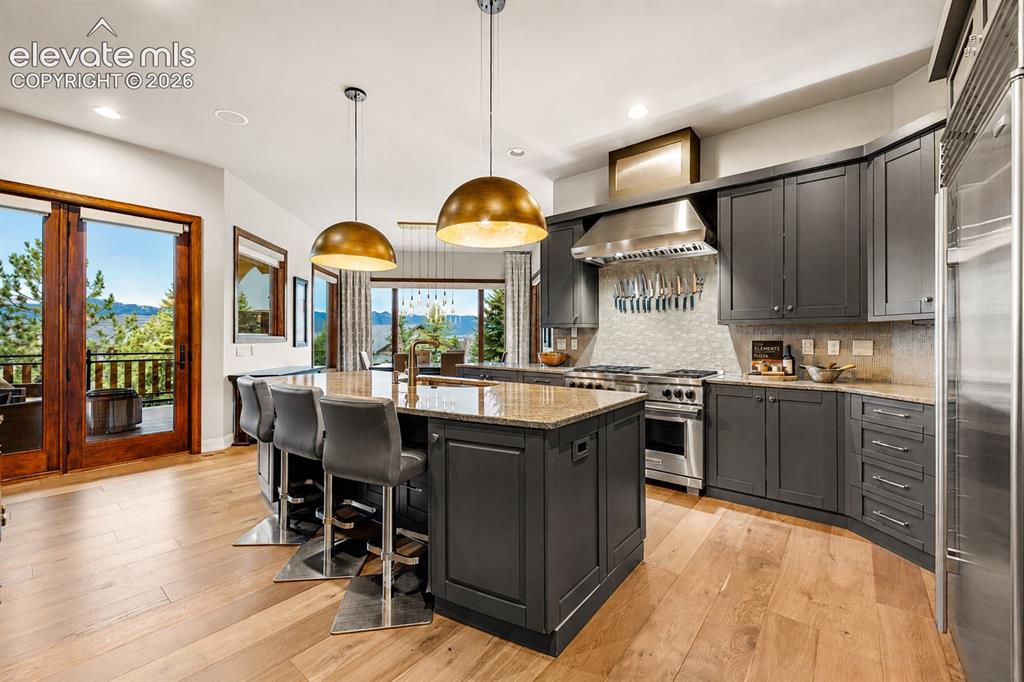 Image 3 of 36: Kitchen with Pikes Peak Views