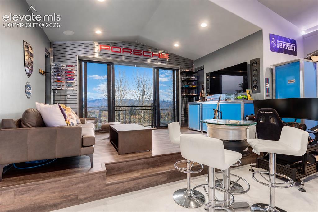 Image 4 of 36: Detached Garage with car lift and man cave