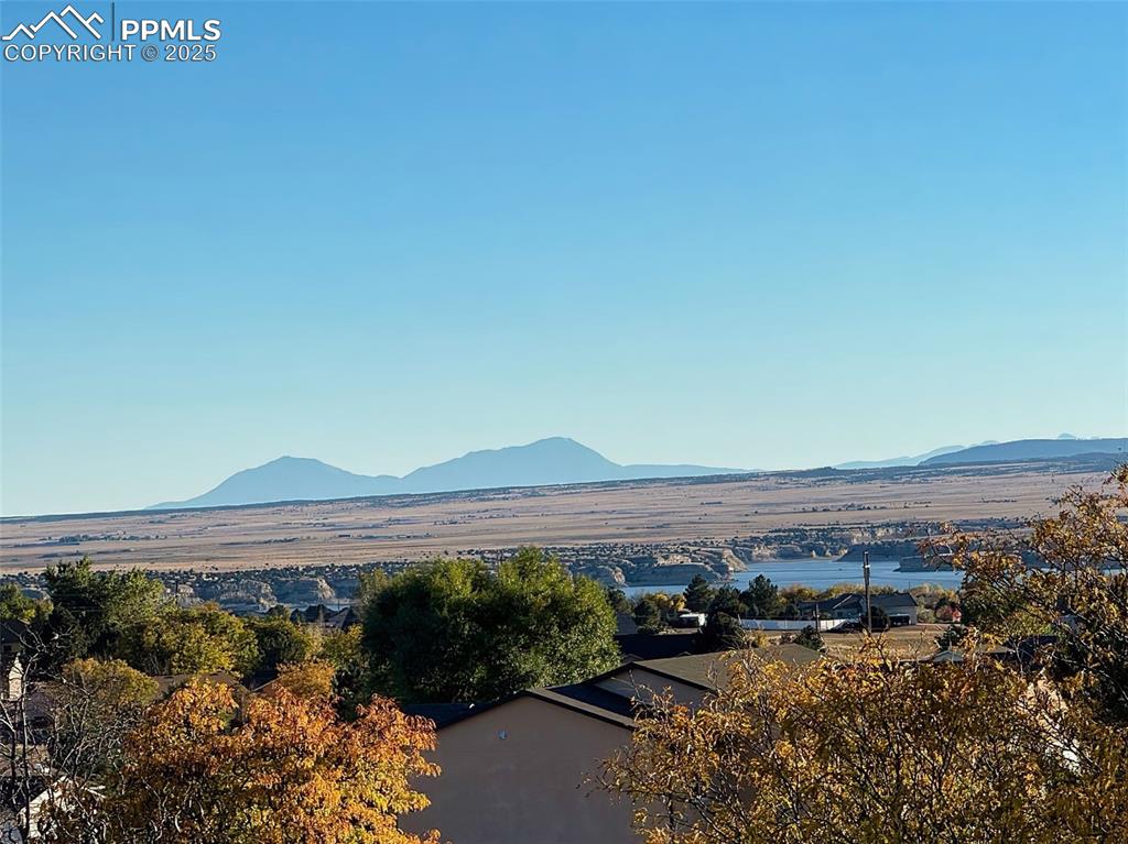 Image 24 of 50: Unobstructed views of Pueblo Reservoir and the Spanish Peaks showcasing the