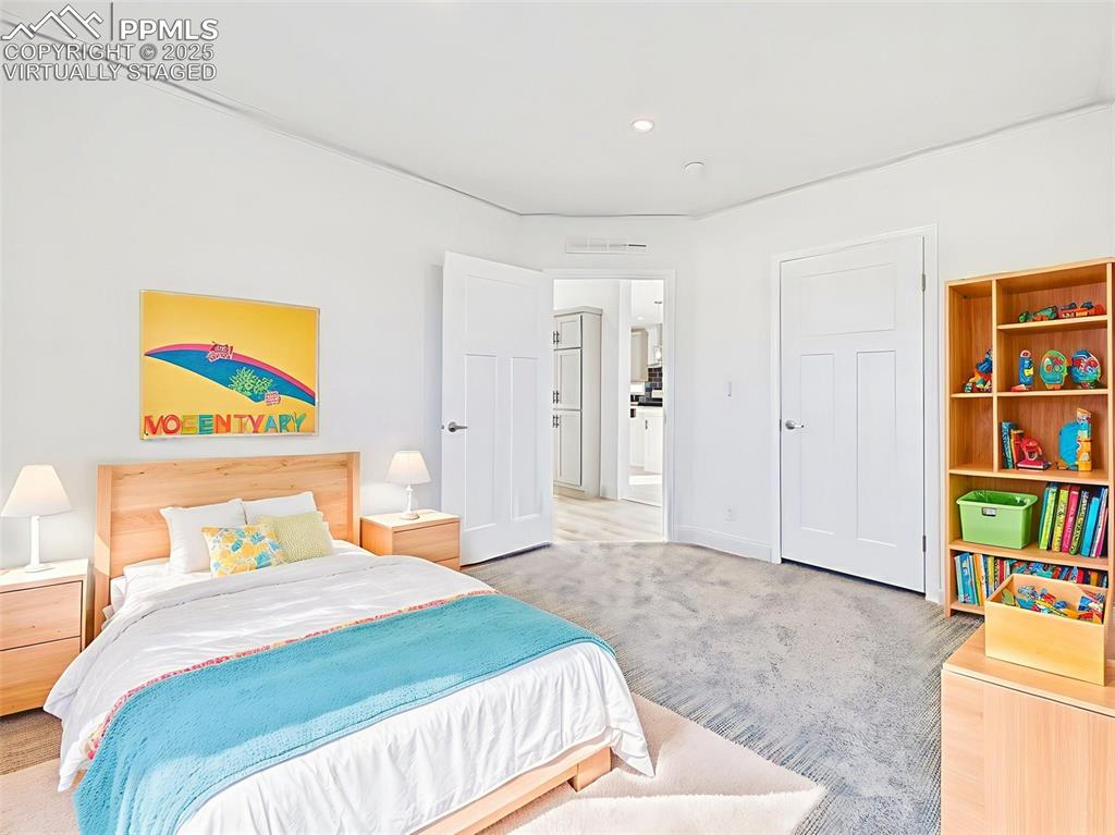 Image 35 of 50: Virtually Staged Versatile secondary bedroom with neutral palette, virtuall