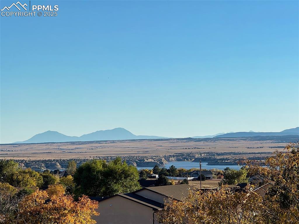 Image 4 of 50: Breathtaking vantage of the surrounding mountains and lake—capturing the tr