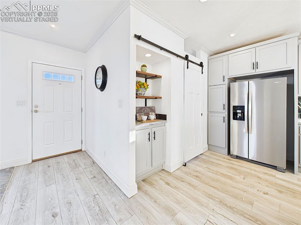 Image 5 of 50: Bright, open living space with large picture windows, natural light—virtual