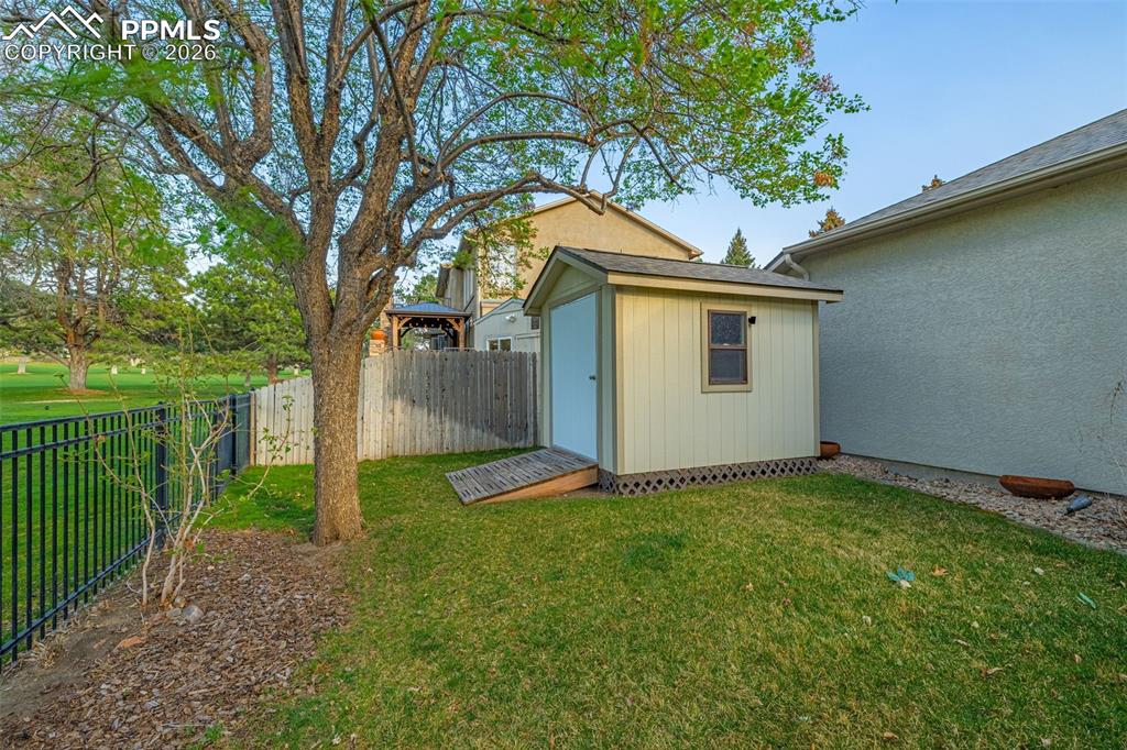 Image 26 of 40: Golf cart shed
