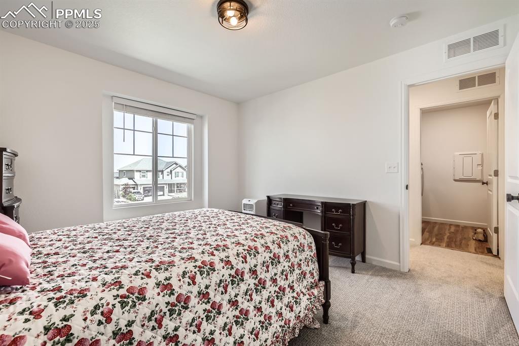 Image 27 of 28: Bedroom featuring carpet and baseboards