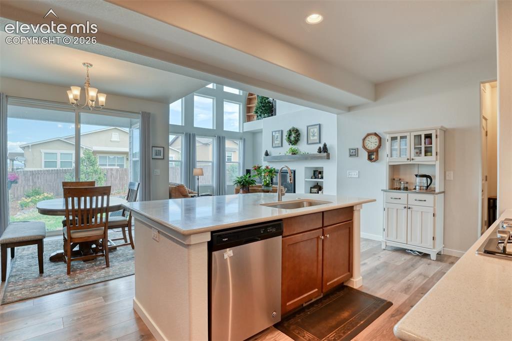 Image 11 of 46: Kitchen Looking into Dining Room and Living Room