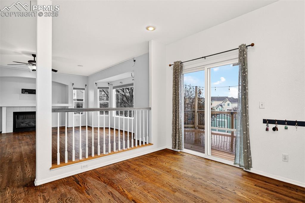 Image 14 of 49: Breakfast Nook with Walk-out to Large Composite Deck