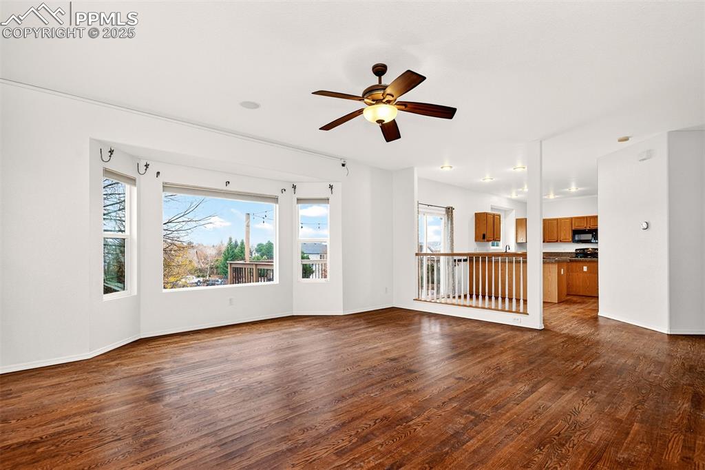 Image 15 of 49: Family Room with Bay Window