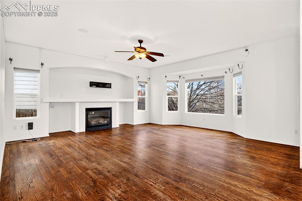 Image 16 of 49: Family Room with Gas Log Fireplace