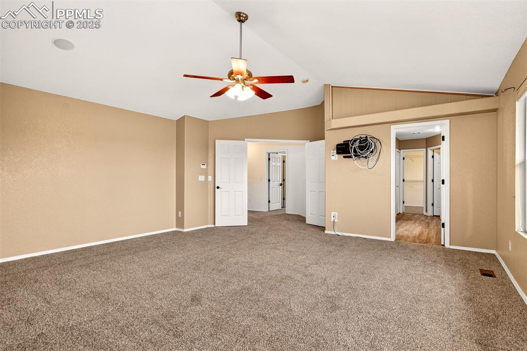 Image 22 of 49: Primary Bedroom with Grand Double Door Entry