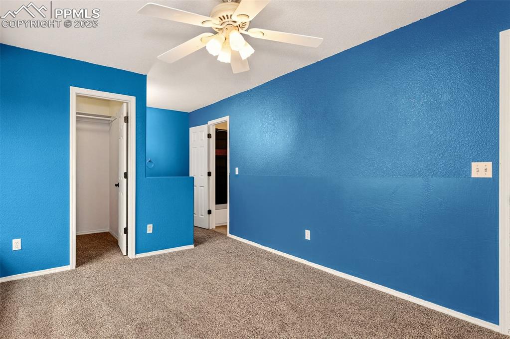 Image 32 of 49: Third Bedroom with Walk-in Closet