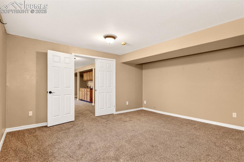 Image 36 of 49: Great Flex Area or 5th BEdroom with New Carpet
