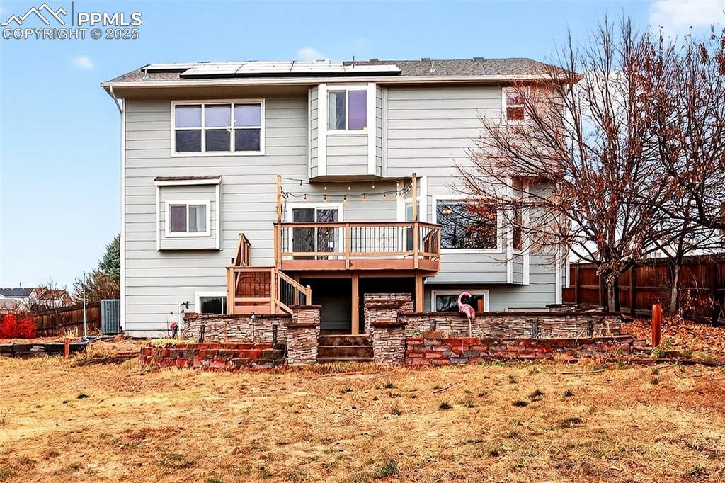 Image 43 of 49: Large Fenced .24 Acre Back Yard