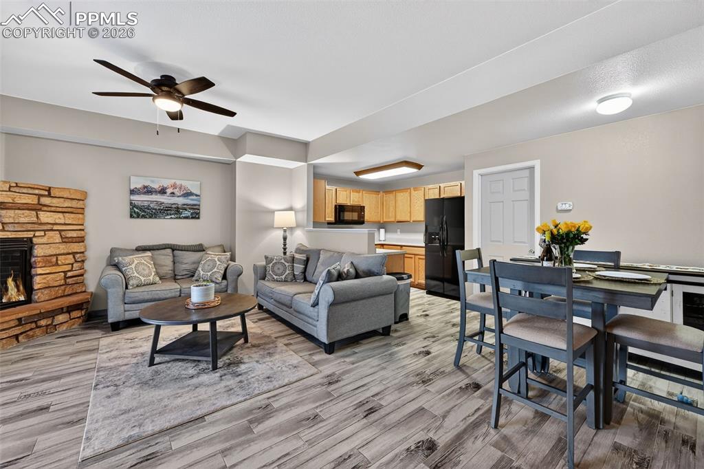 Image 4 of 21: Enter into the living room, beautiful tiled floor, natural light, open floo