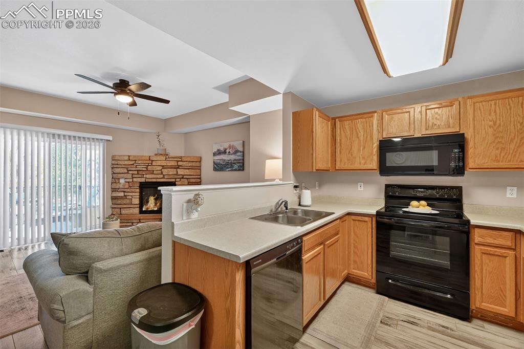 Image 7 of 21: Kitchen with plenty of cabinet space and countertop area. 