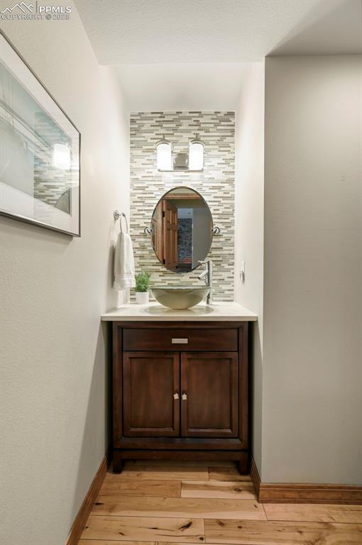 Image 22 of 49: Main level powder room