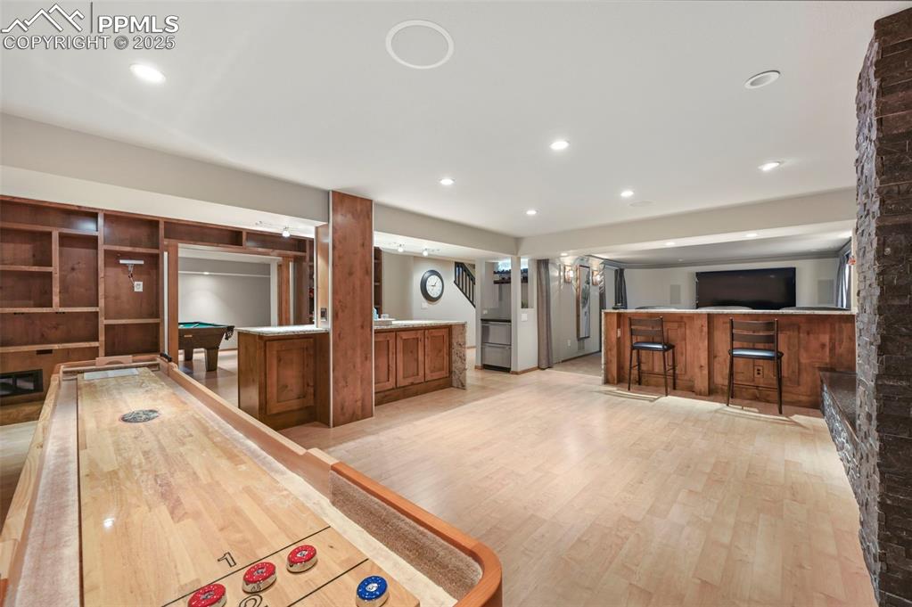 Image 33 of 49: Lower level family room