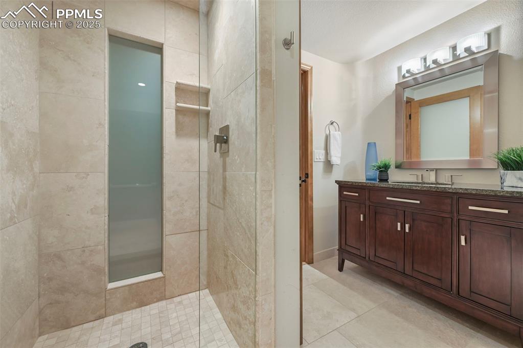 Image 39 of 49: Lower level bathroom