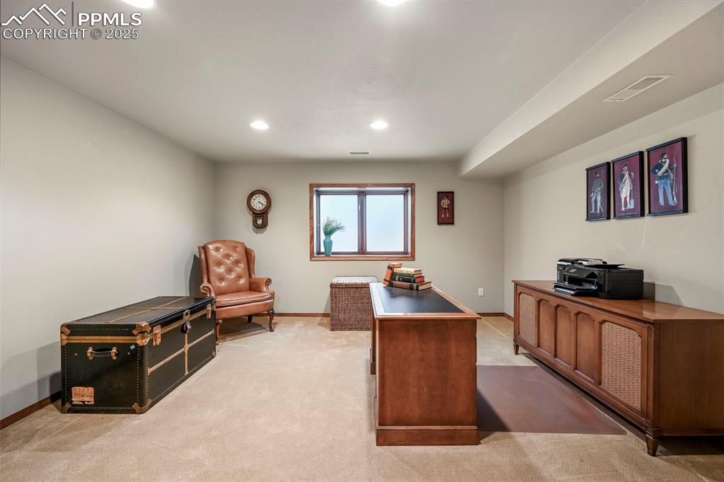 Image 40 of 49: Lower level bedroom with a big walk-in closet