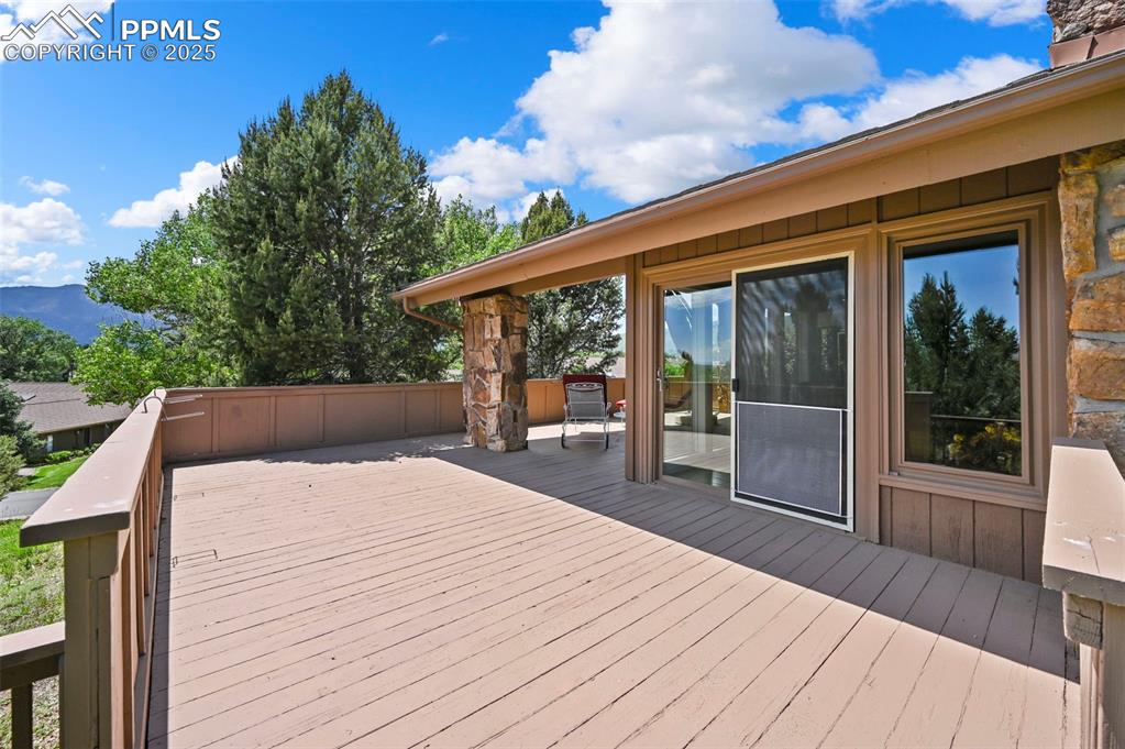 Image 8 of 49: Huge deck with city and front range views 