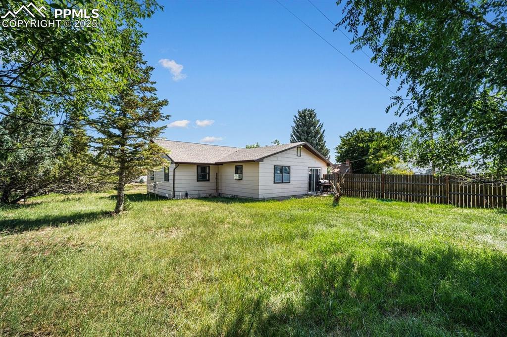 Image 27 of 38: Rear view of property