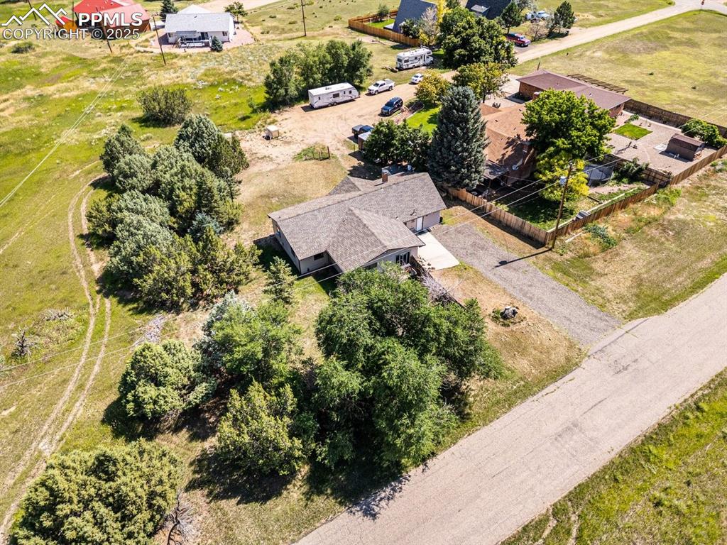 Image 35 of 38: Aerial view of property and surrounding area