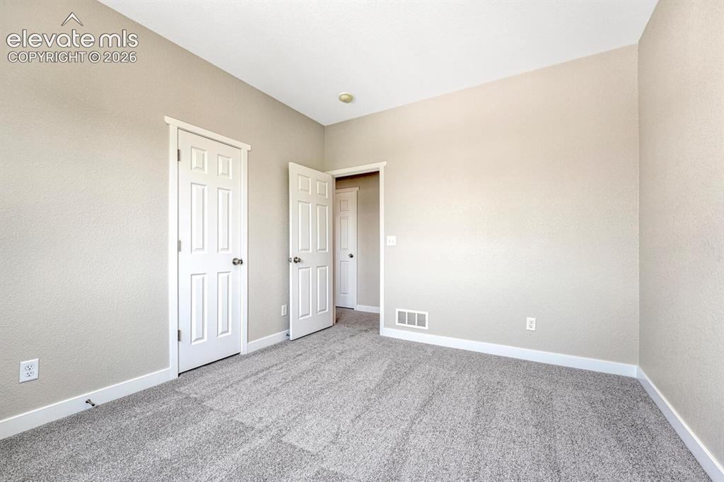 Image 14 of 28: Bedroom