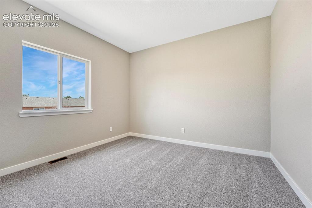 Image 15 of 28: Choose the carpet and paint for both bedrooms!
