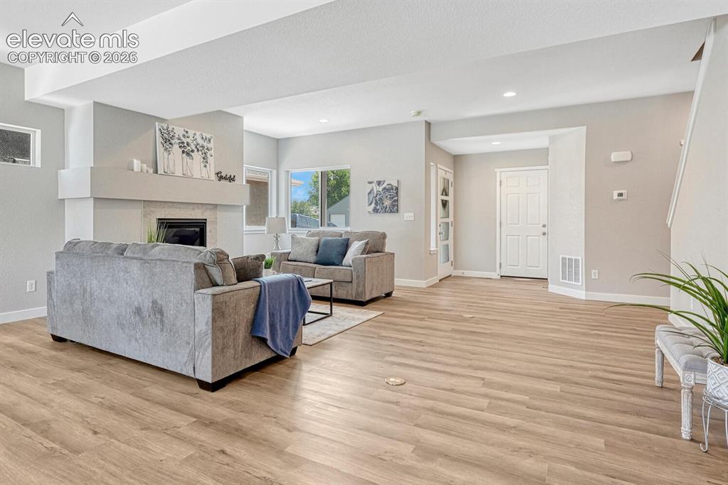 Image 3 of 28: 9 ft airy ceilings with your choice of durable and long lasting LVP. Choose