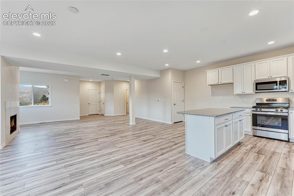 Image 6 of 28: Choose your cabinet style and finish. Gas range and refrigerator included s